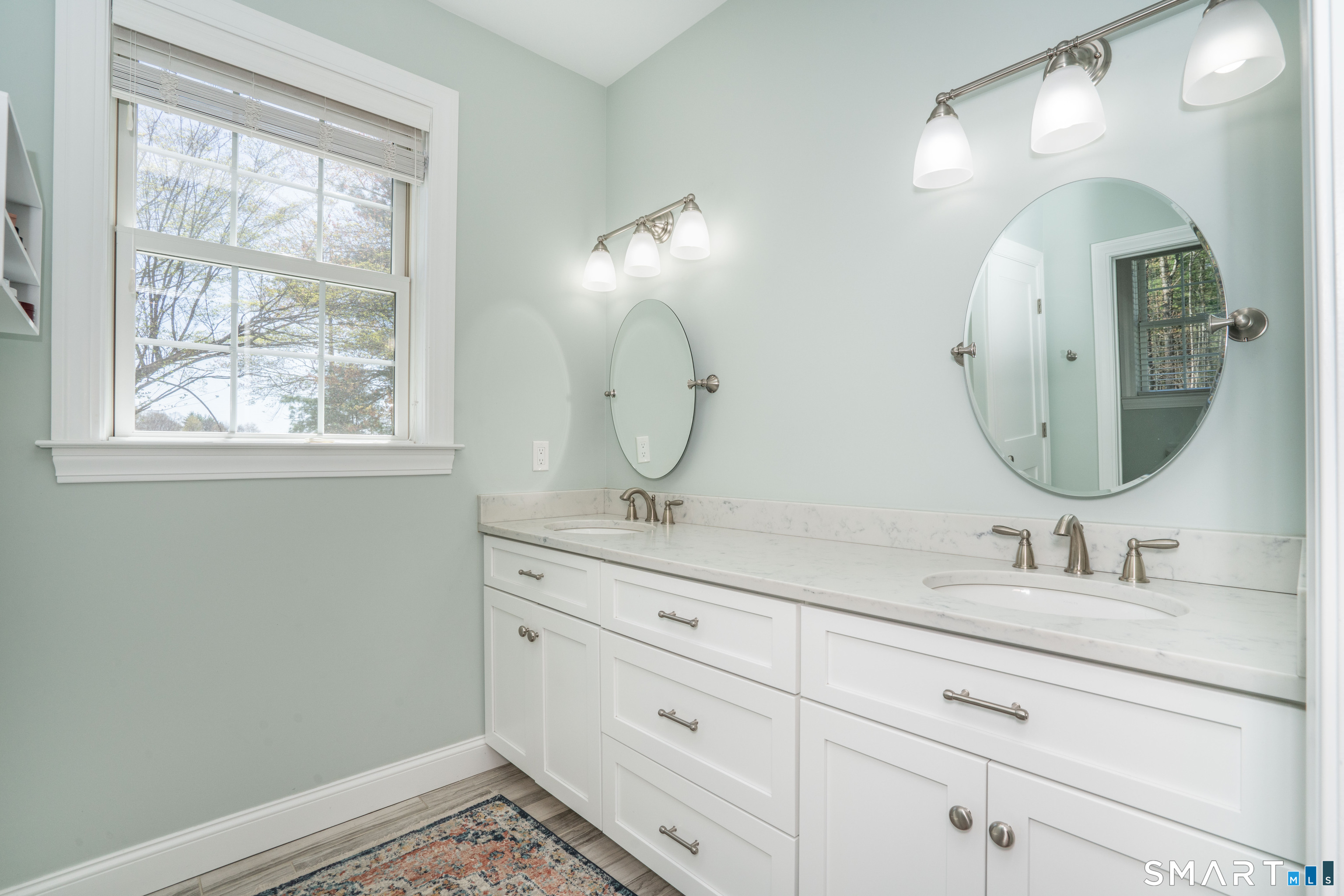 152 Old Farms Road Simsbury, CT 06070 - Photo 23 of 40 Primary bathroom features a double vanity and private water closet for the toilet and shower