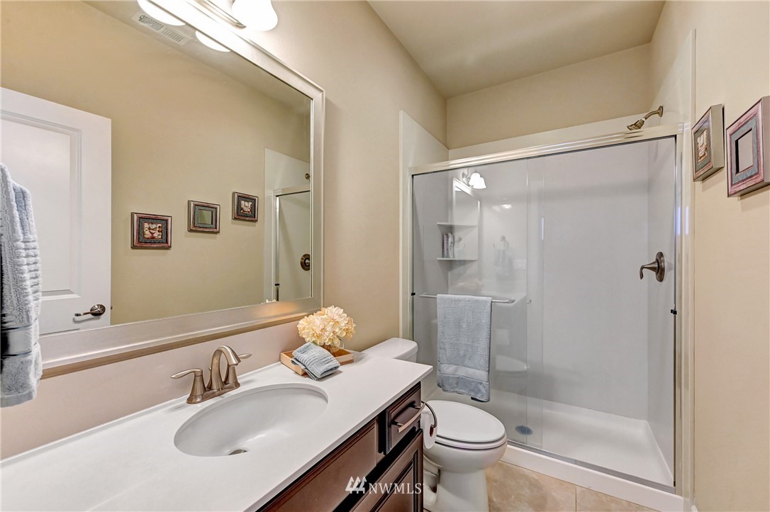 3228 170th Place Southeast Bothell, WA 98012 - Photo 16 of 40 a bathroom with a sink toilet and shower