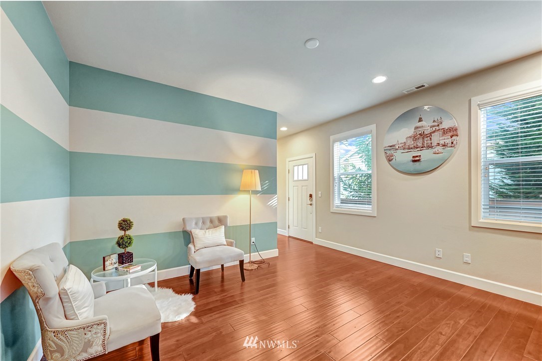 3228 170th Place Southeast Bothell, WA 98012 - Photo 17 of 40 a living room with furniture and a window