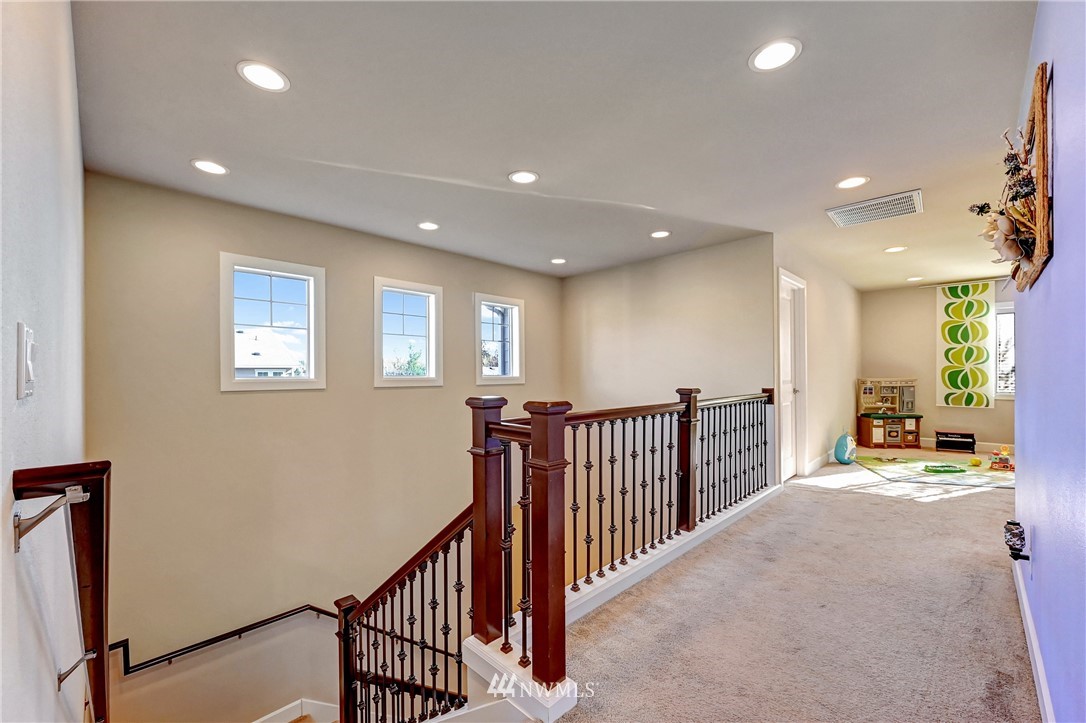 3228 170th Place Southeast Bothell, WA 98012 - Photo 22 of 40 a view of a hallway with workspace