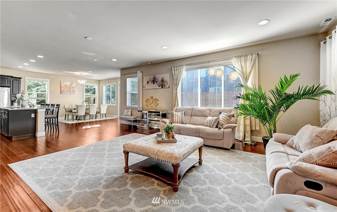 3228 170th Place Southeast Bothell, WA 98012 - Photo 24 of 40 a living room with furniture and a large window