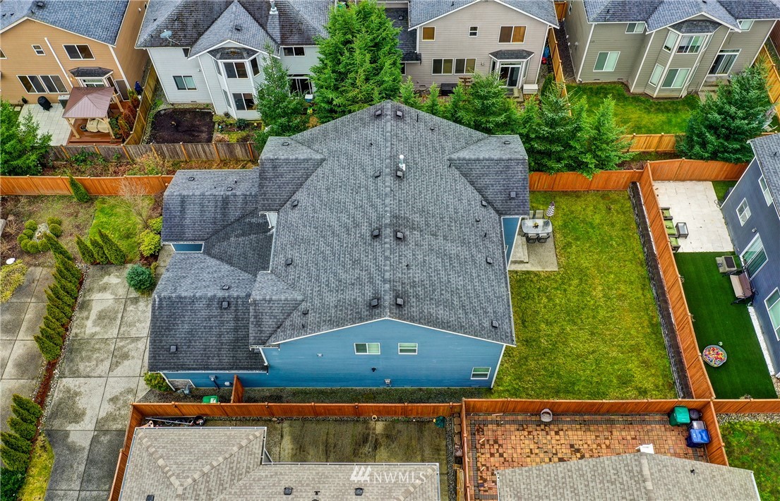 3228 170th Place Southeast Bothell, WA 98012 - Photo 39 of 40 an aerial view of multiple houses with a yard