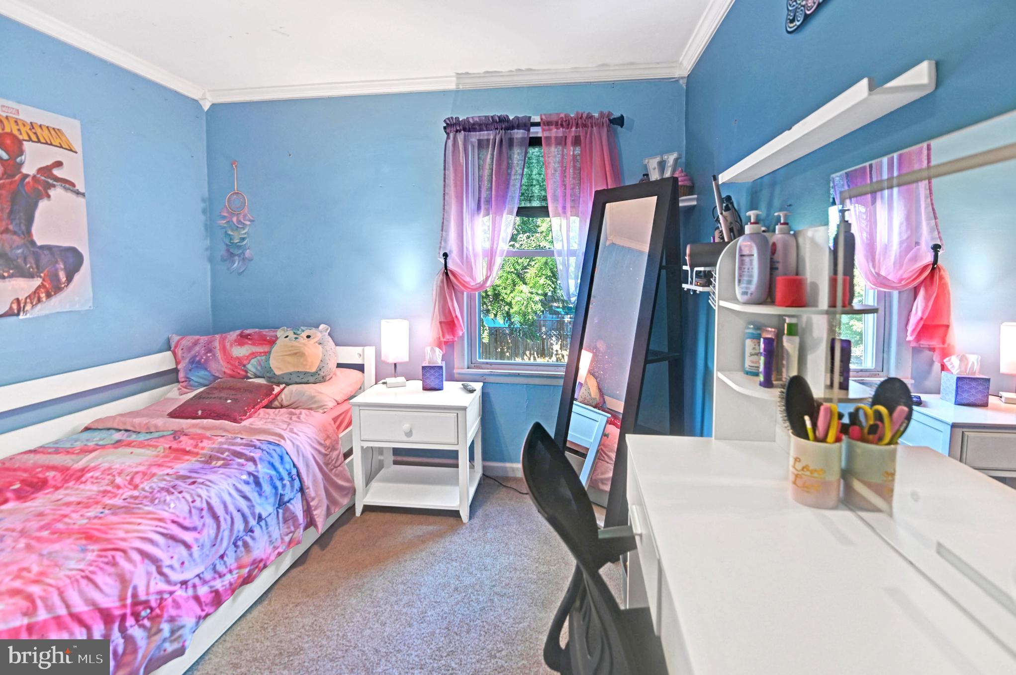 215 Haakon Road Brooklawn, NJ 08030 - Photo 13 of 20 a bedroom with a bed and a window