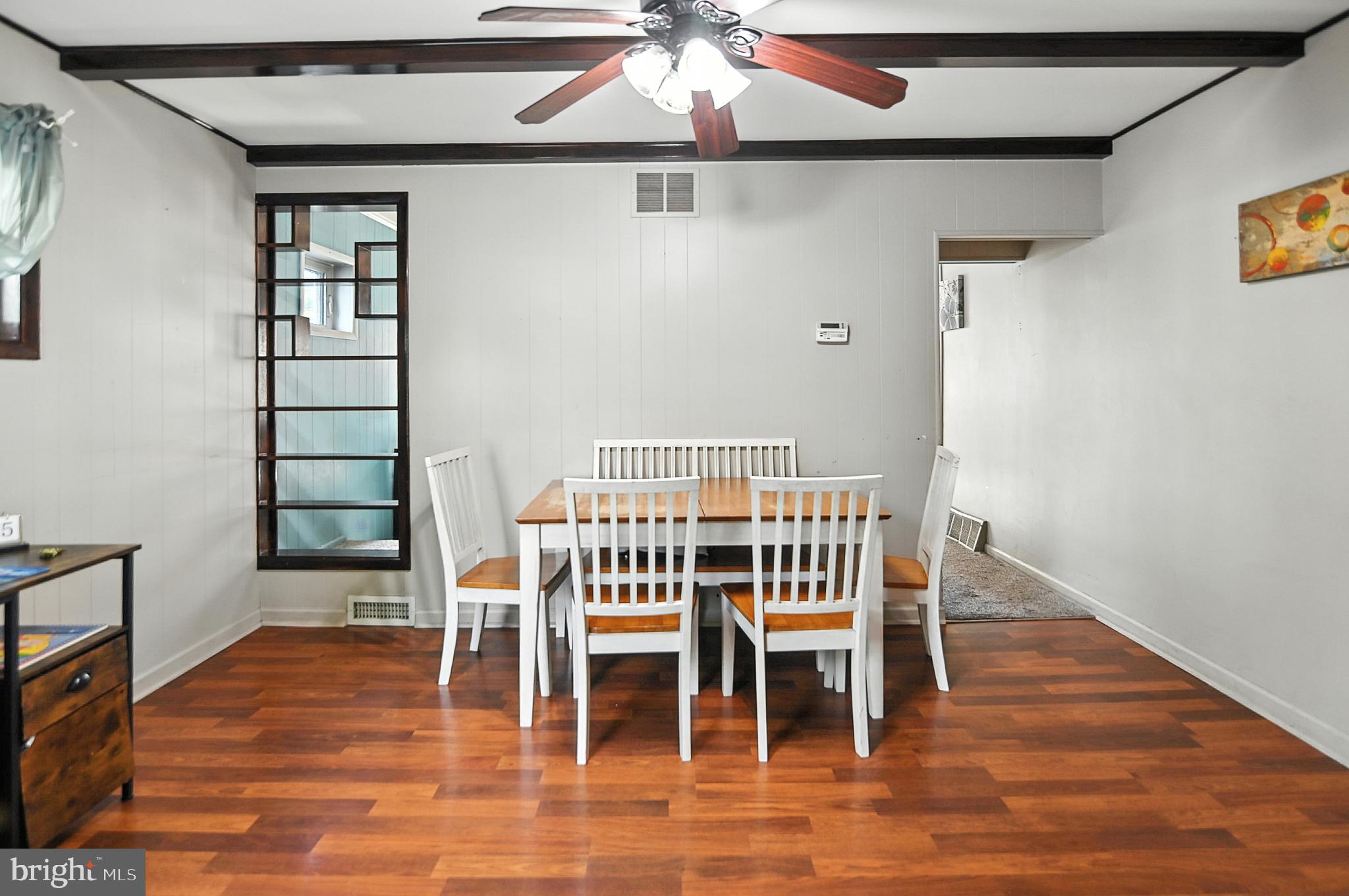 215 Haakon Road Brooklawn, NJ 08030 - Photo 4 of 20 a view of a dining room with furniture and wooden floor