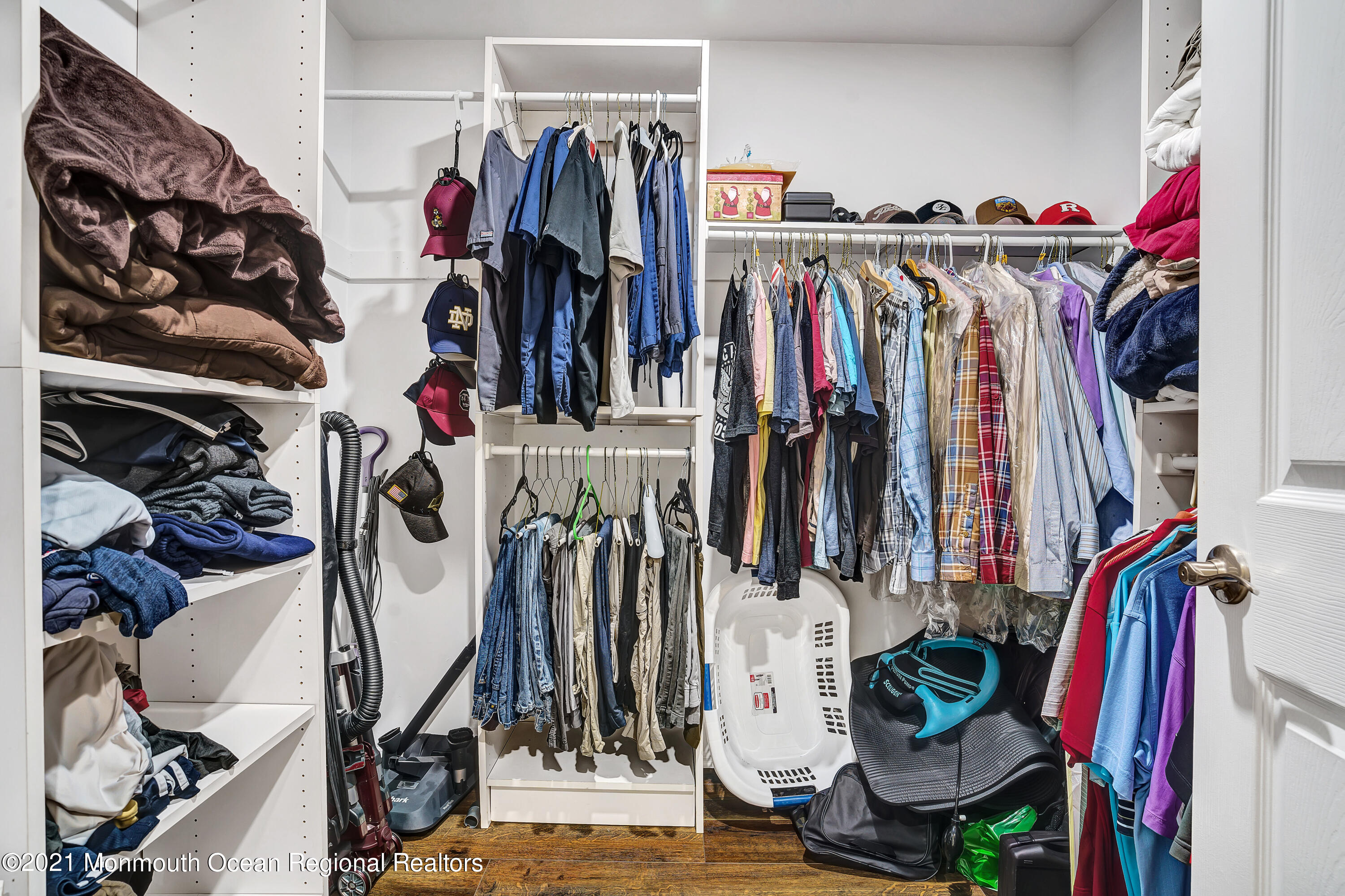 7 Racquet Road Wall, NJ 07719 - Photo 22 of 28 a view of walk in closet with clothes