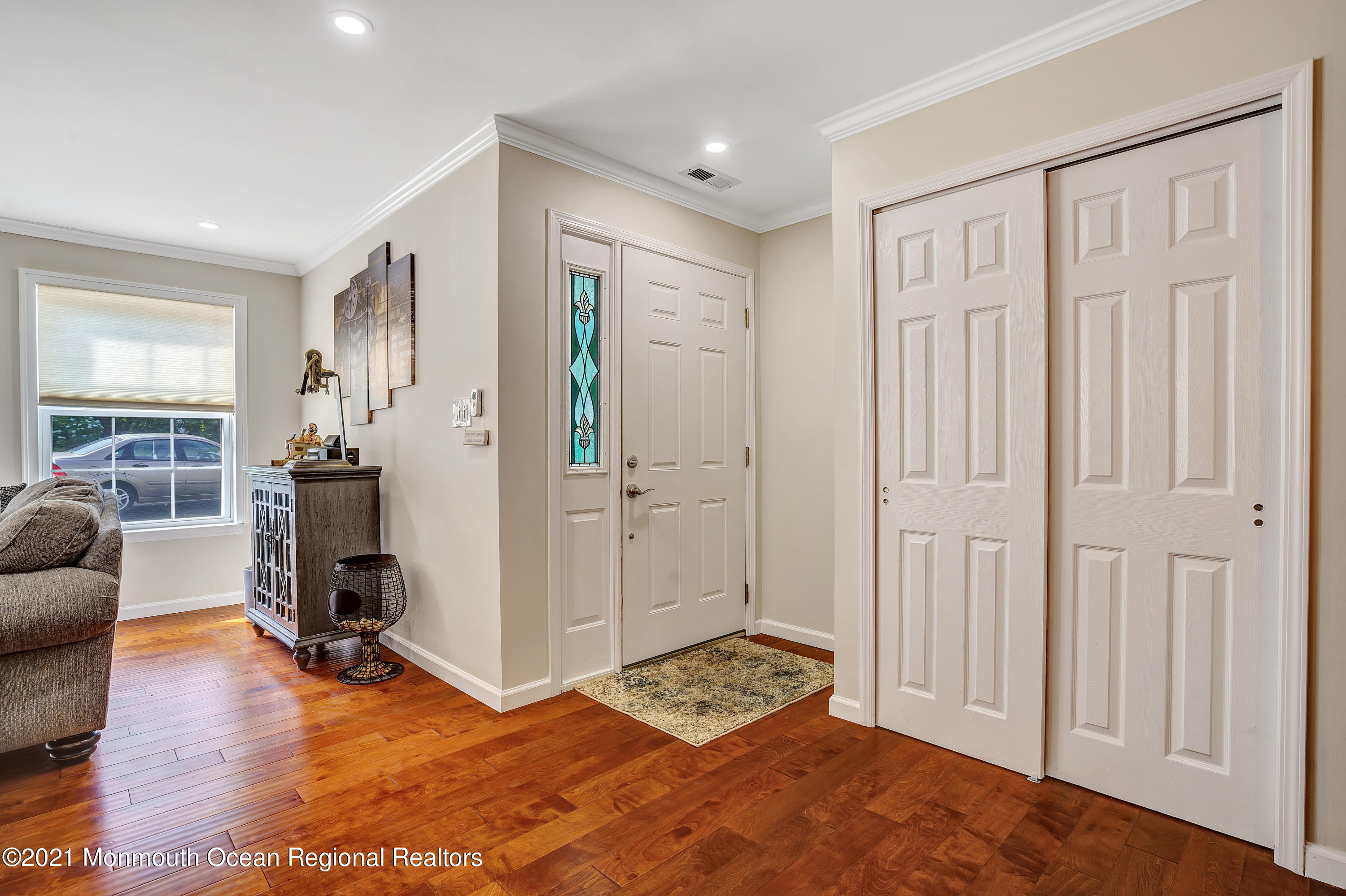 7 Racquet Road Wall, NJ 07719 - Photo 5 of 28 a view of livingroom with furniture and wooden floor