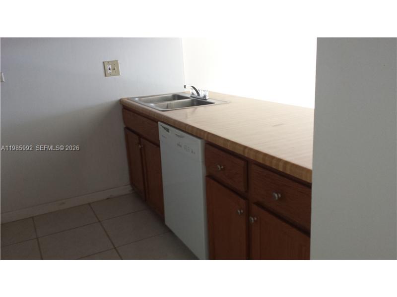 3720 Inverrary Drive, Unit 2M Lauderhill, FL 33319 - Photo 11 of 11 Kitchen