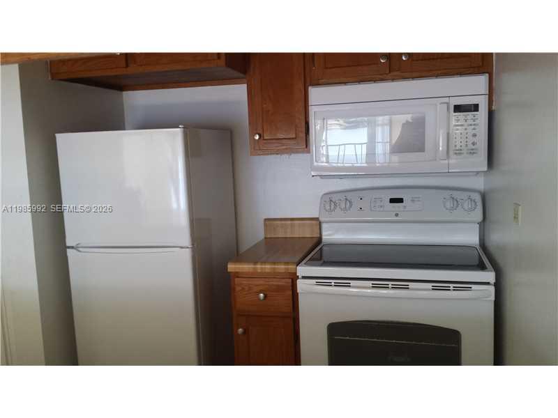 3720 Inverrary Drive, Unit 2M Lauderhill, FL 33319 - Photo 10 of 11 Kitchen