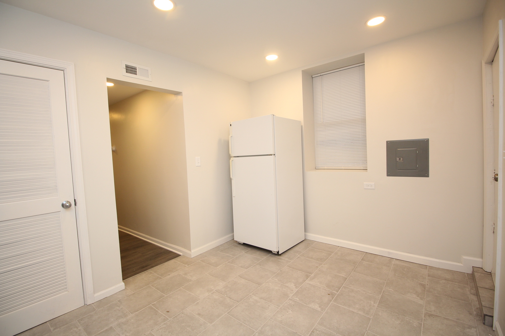 120 North Spring Street, Unit 1 Elgin, IL 60120 - Photo 5 of 12 an empty room with closet