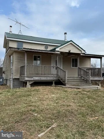 a front view of a house with garage