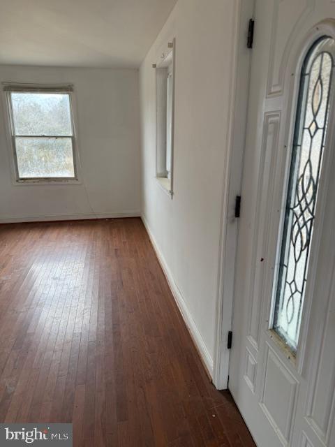 21365 Canoe Neck Way Abell, MD 20606 - Photo 4 of 23 wooden floor in an empty room with a window