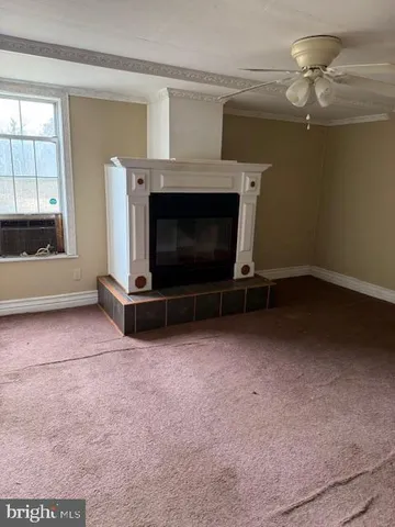 a living room with a fireplace