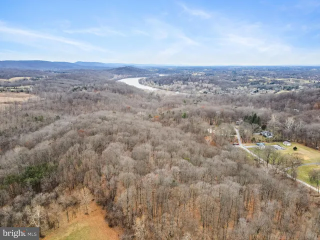 a view of an ocean and a mountain