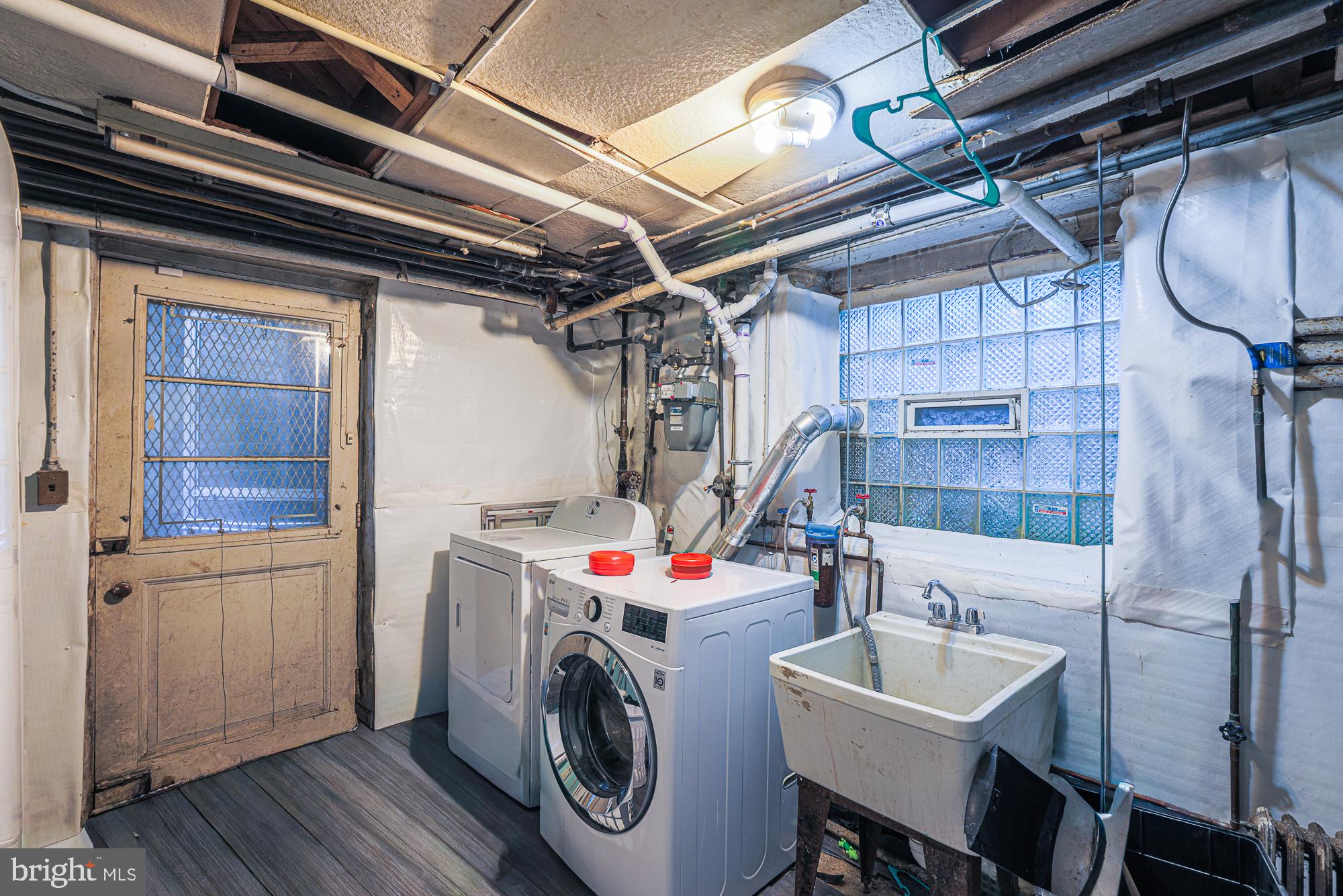 3305 Bancroft Road Baltimore, MD 21215 - Photo 45 of 61 Functional laundry space with charm.