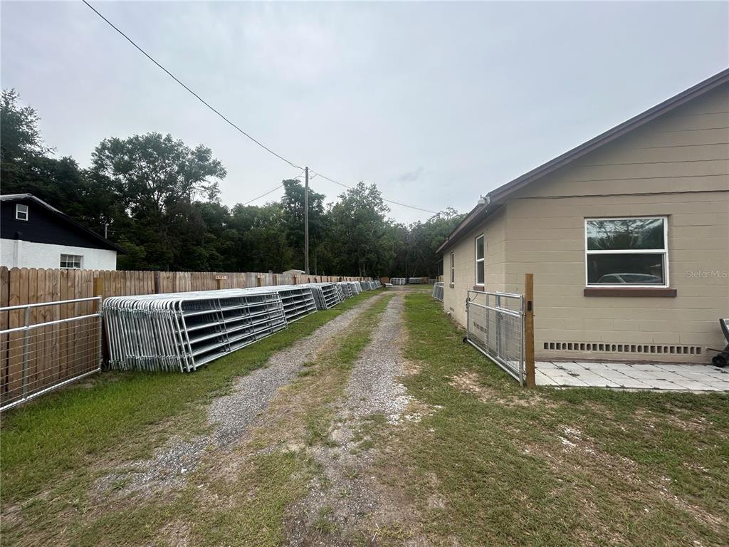 18133 Highway 41 Spring Hill, FL 34610 - Photo 2 of 18 a view of a house with backyard and wooden fence