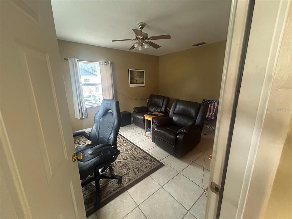 18133 Highway 41 Spring Hill, FL 34610 - Photo 4 of 18 a living room with furniture