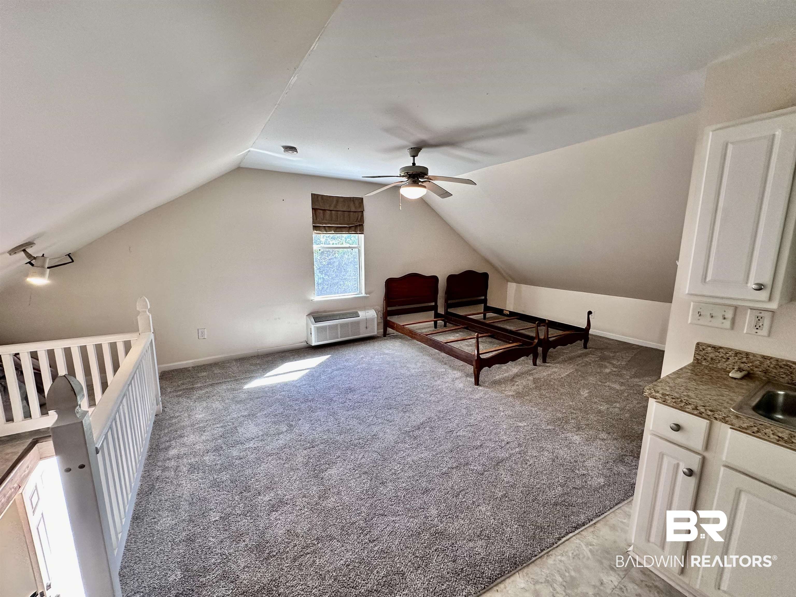 260 Siena Vista Street Mobile, AL 36607 - Photo 37 of 41 Interior space with a ceiling fan, light colored carpet, lofted ceiling, and a wall mounted AC