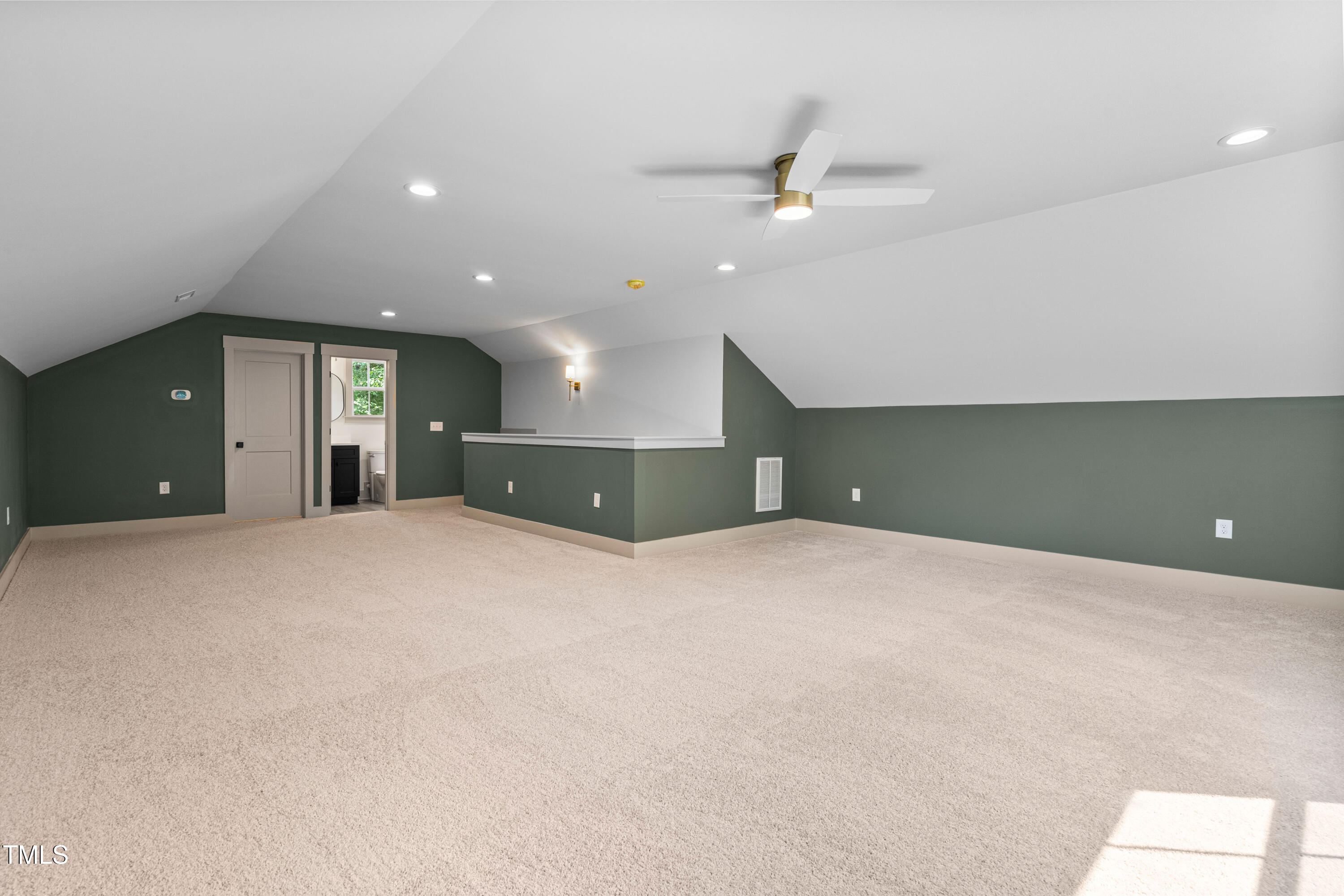 312 Russ Road Smithfield, NC 27577 - Photo 44 of 62 a view of empty room with a ceiling fan and window