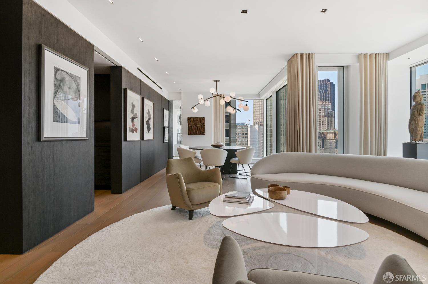 188 Minna, Unit 27A San Francisco, CA 94105 - Photo 11 of 42 a living room with furniture and large windows