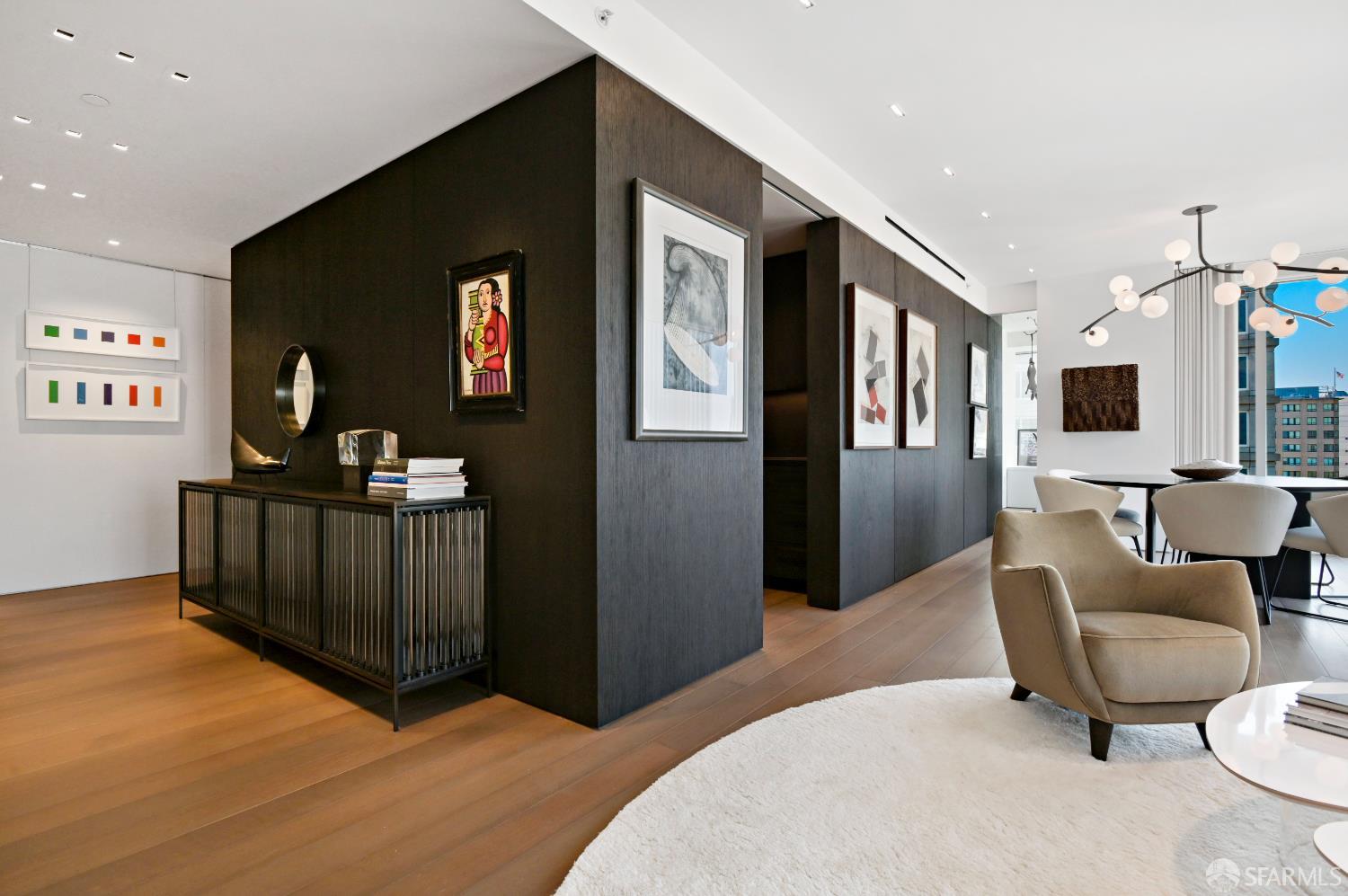 188 Minna, Unit 27A San Francisco, CA 94105 - Photo 12 of 42 a living room with furniture and a flat screen tv