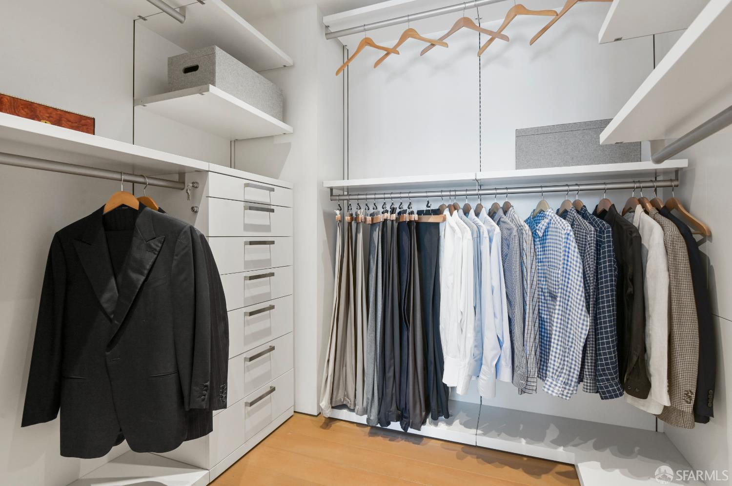 188 Minna, Unit 27A San Francisco, CA 94105 - Photo 19 of 42 a view of walk in closet with clothes and shoes