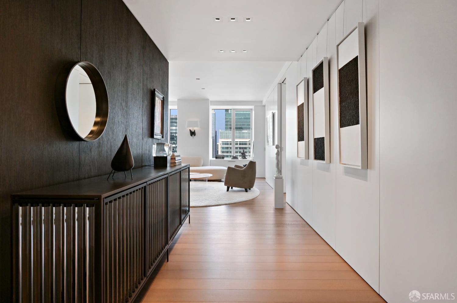 188 Minna, Unit 27A San Francisco, CA 94105 - Photo 8 of 42 a living room with furniture and a large window