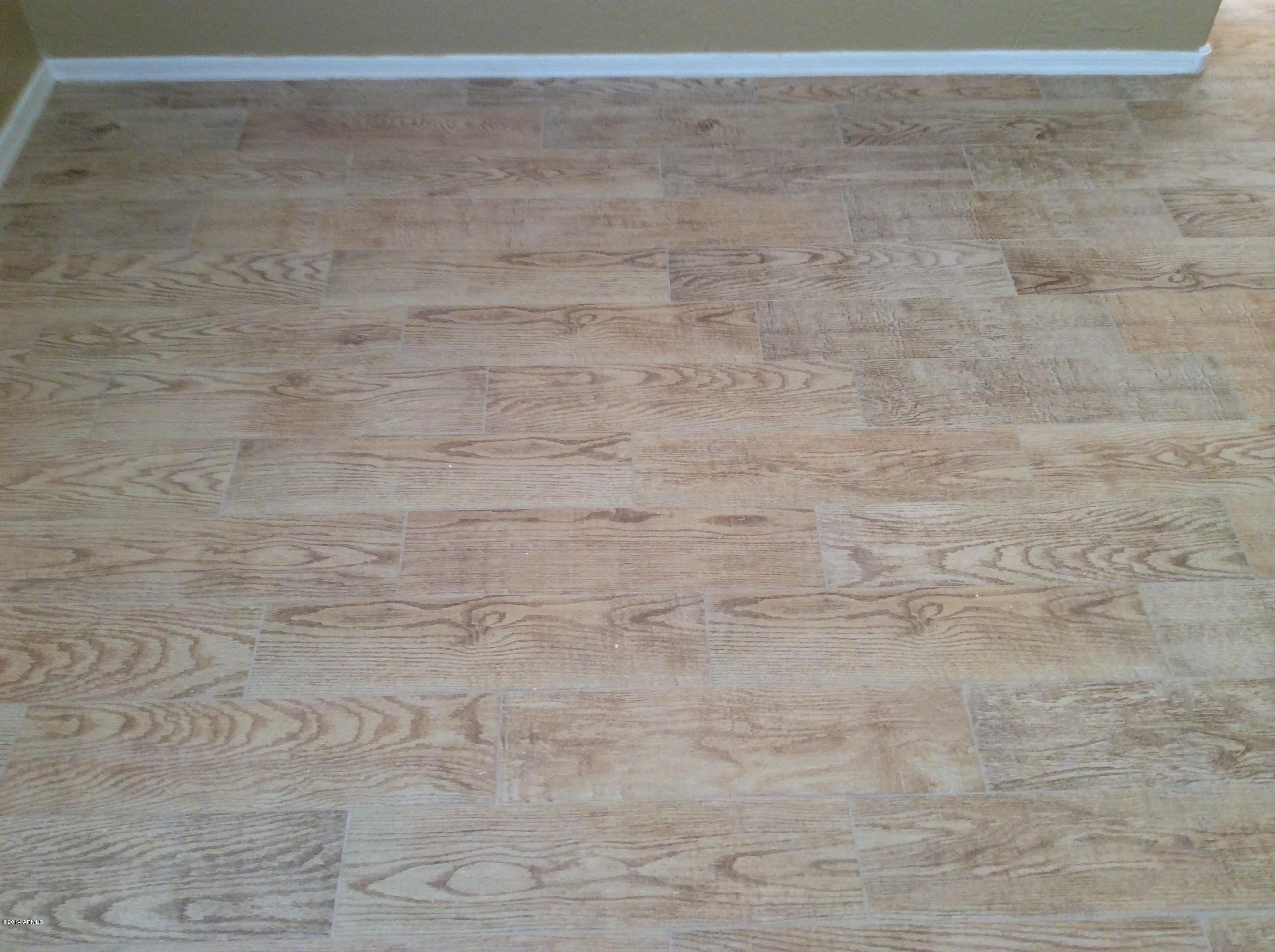 1702 South Rome Street Gilbert, AZ 85295 - Photo 6 of 14 Natural Wood Porcelan Tile