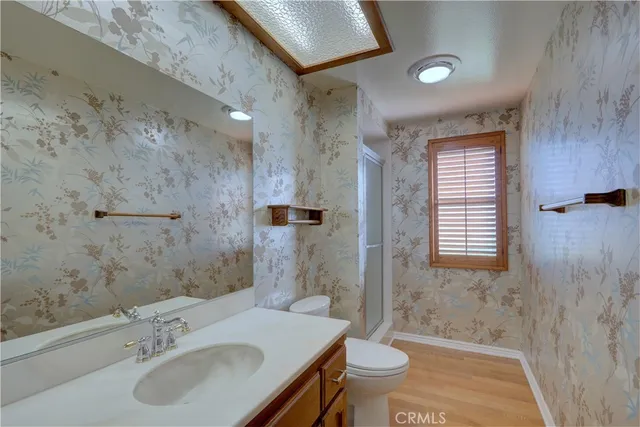 a view of a backyard with sitting area