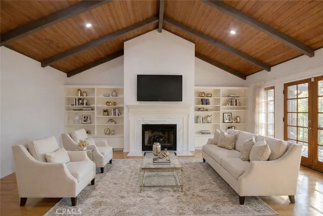 a kitchen with stainless steel appliances granite countertop a refrigerator stove and sink