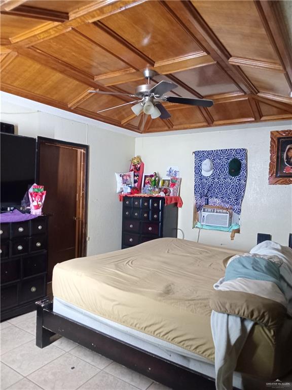 5614 Acapulco Street Rio Grande City, TX 78582 - Photo 6 of 11 a bedroom with a bed and a chandelier