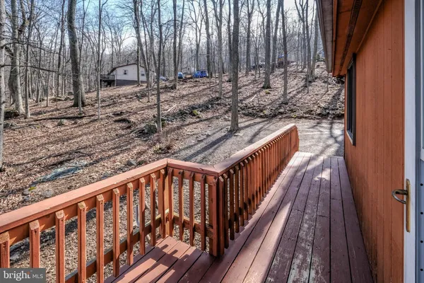 a kitchen with a refrigerator sink and cabinets