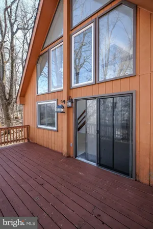 a room with a sink and mirror