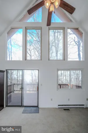 a bathroom with a sink a toilet and bathtub