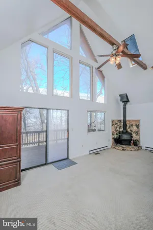 a view of a living room and entry way