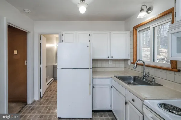 a view of a room that has a large window