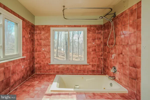 a view of outdoor space and wooden deck