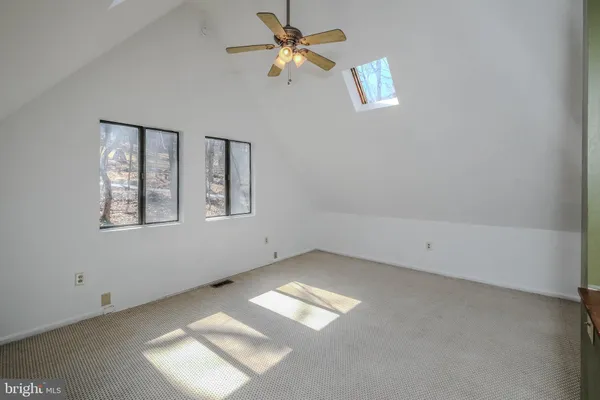 a view of a lake with a mountain in the background