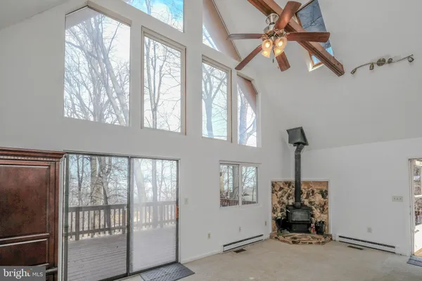 a view of a balcony with trees
