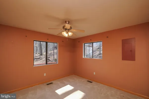 a view of a bench in a park