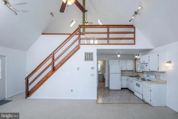 a view of a balcony with a tree