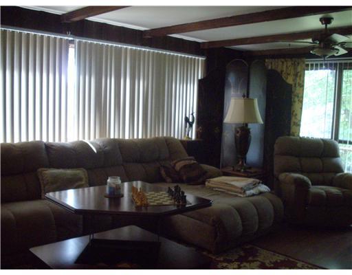 2391 Ridge Rd Extension Economy, PA 15003 - Photo 4 of 18 Living Room. Walls of glass in the living room.