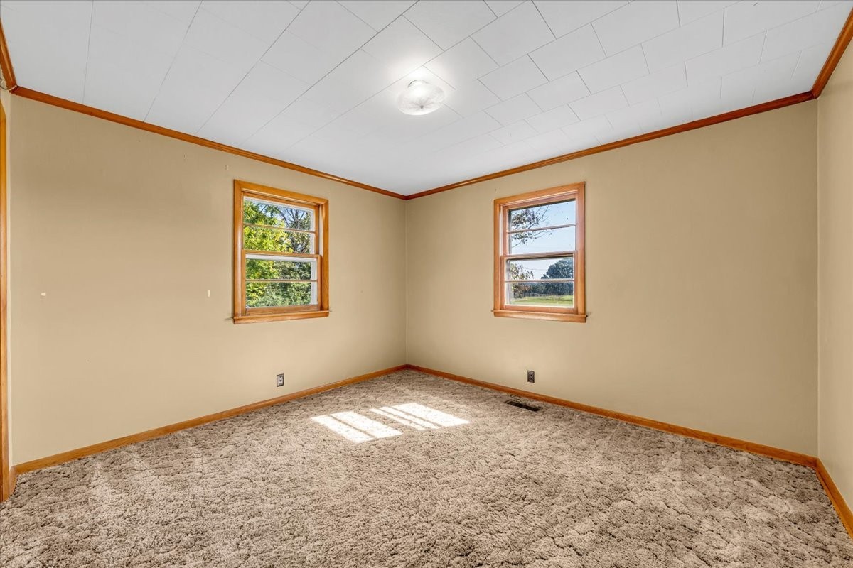 341 Rigsby Road Smithville, TN 37166 - Photo 12 of 34 a view of an empty room with a window
