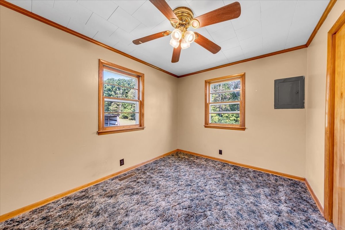 341 Rigsby Road Smithville, TN 37166 - Photo 14 of 34 a view of room with window and ceiling fan