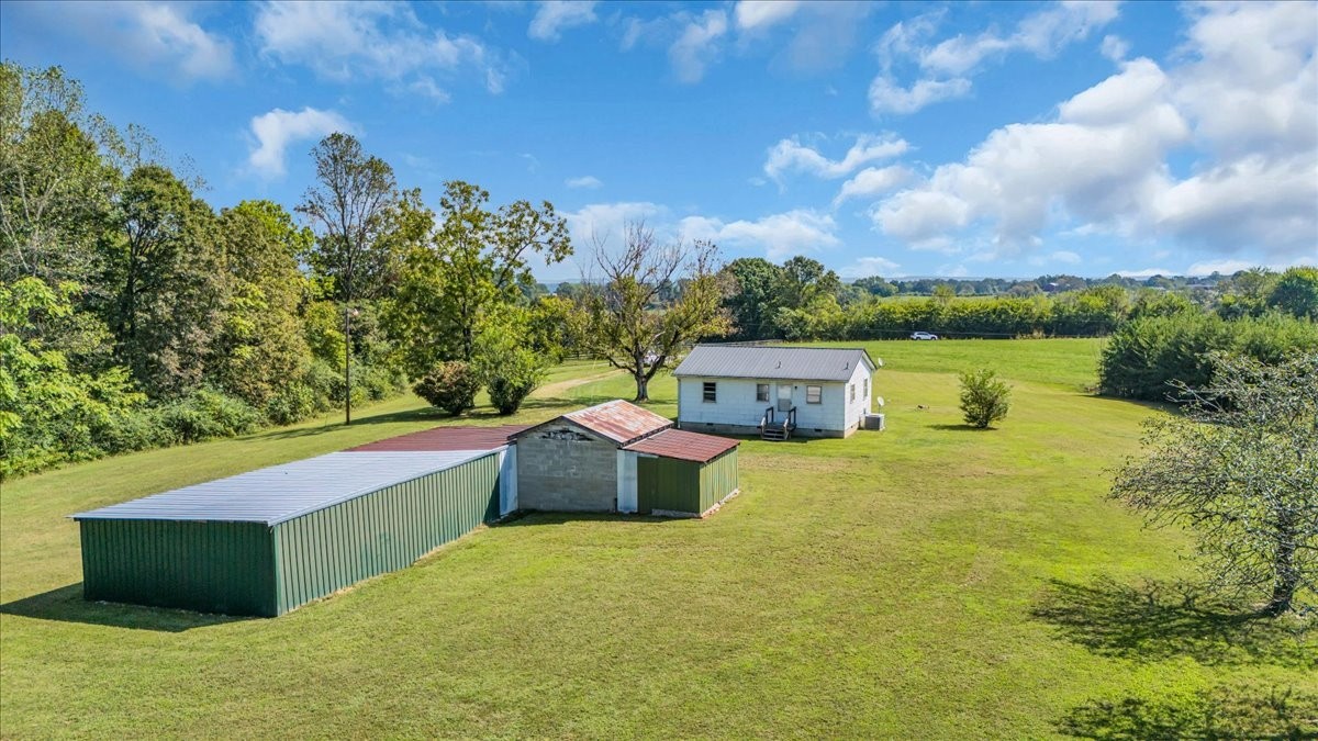 341 Rigsby Road Smithville, TN 37166 - Photo 21 of 34 a view of a garden with an outdoor space