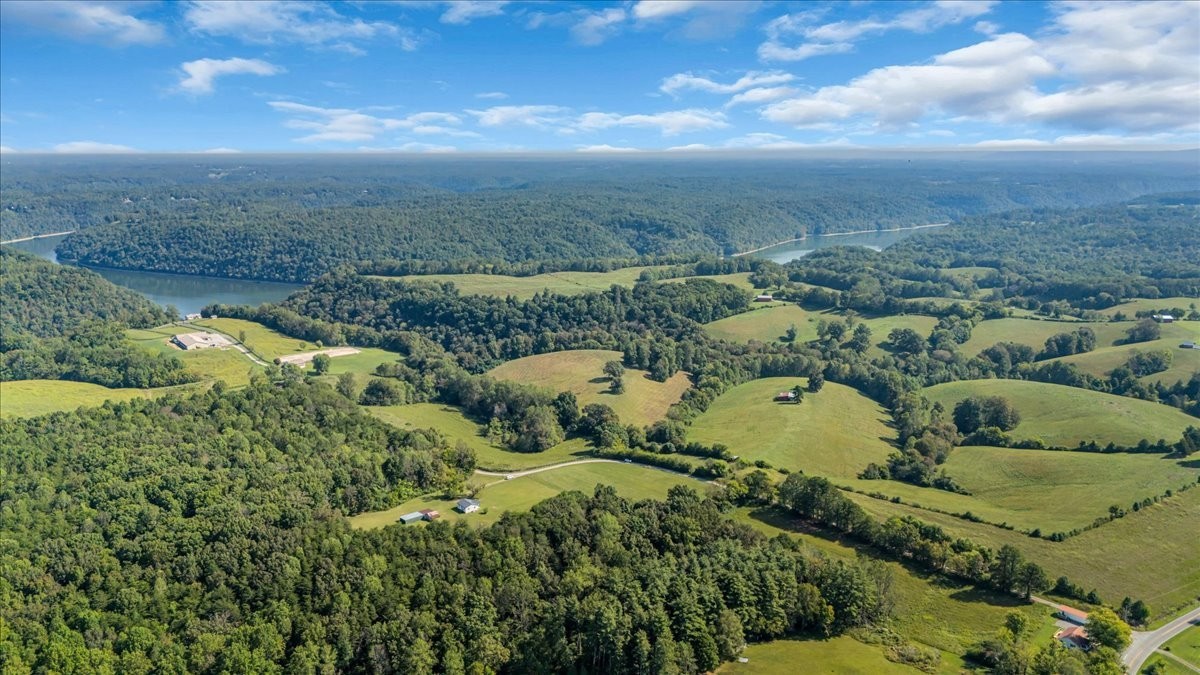 341 Rigsby Road Smithville, TN 37166 - Photo 30 of 34 an aerial view of residential houses with outdoor space