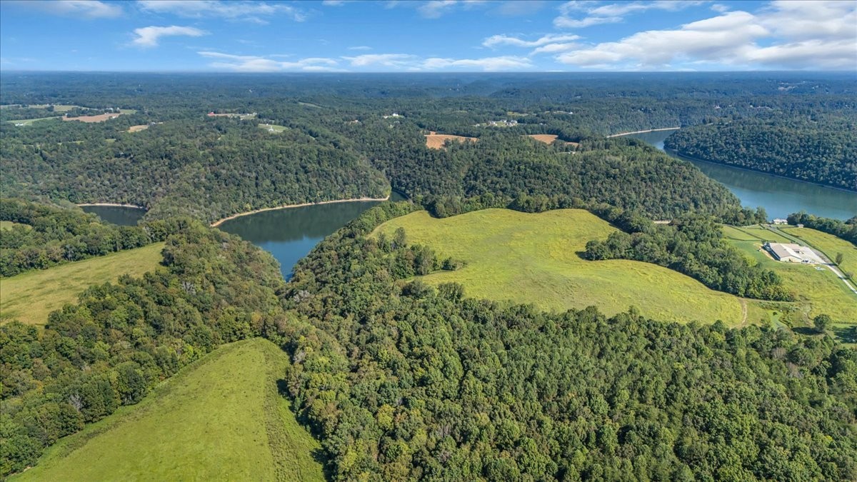 341 Rigsby Road Smithville, TN 37166 - Photo 31 of 34 a view of a lake and green valley