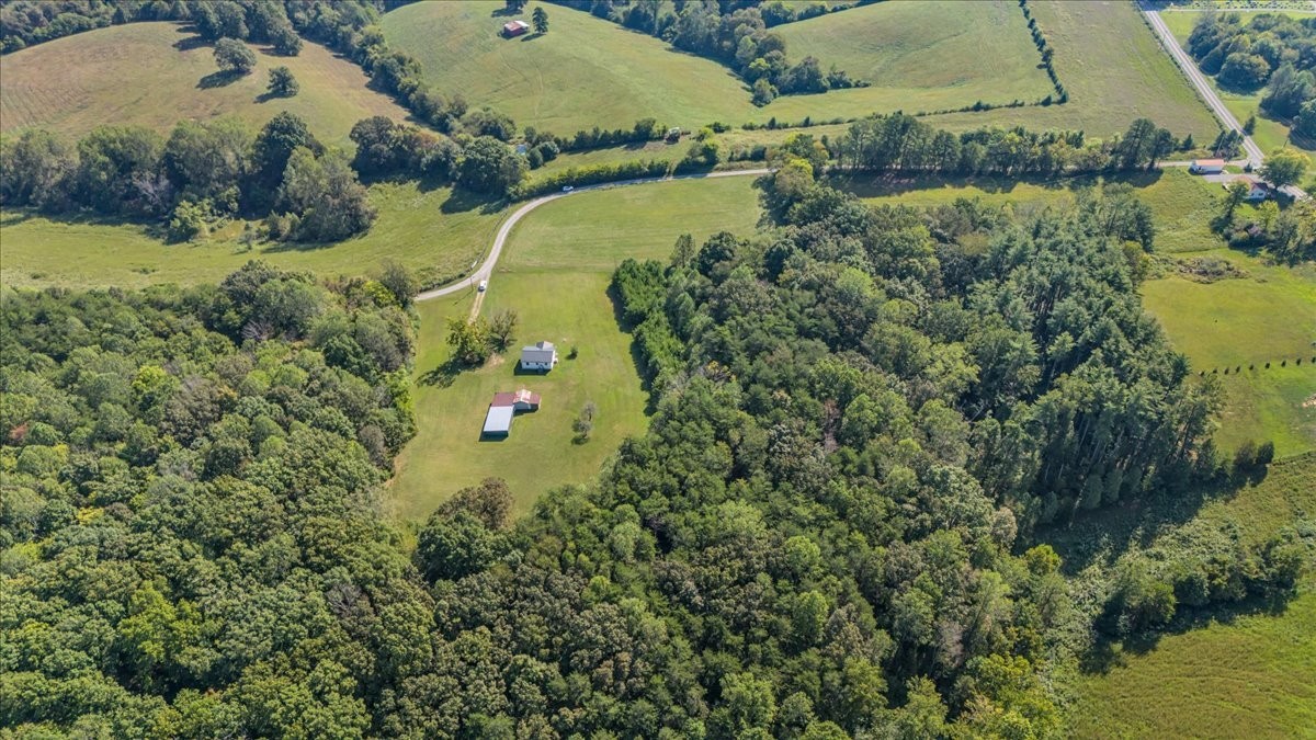 341 Rigsby Road Smithville, TN 37166 - Photo 32 of 34 an aerial view of a house with yard swimming pool and outdoor seating