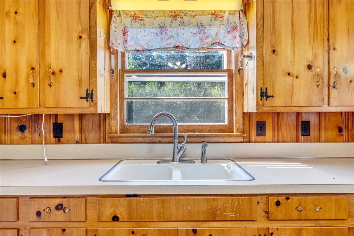 341 Rigsby Road Smithville, TN 37166 - Photo 10 of 34 a bathroom with a sink and a mirror