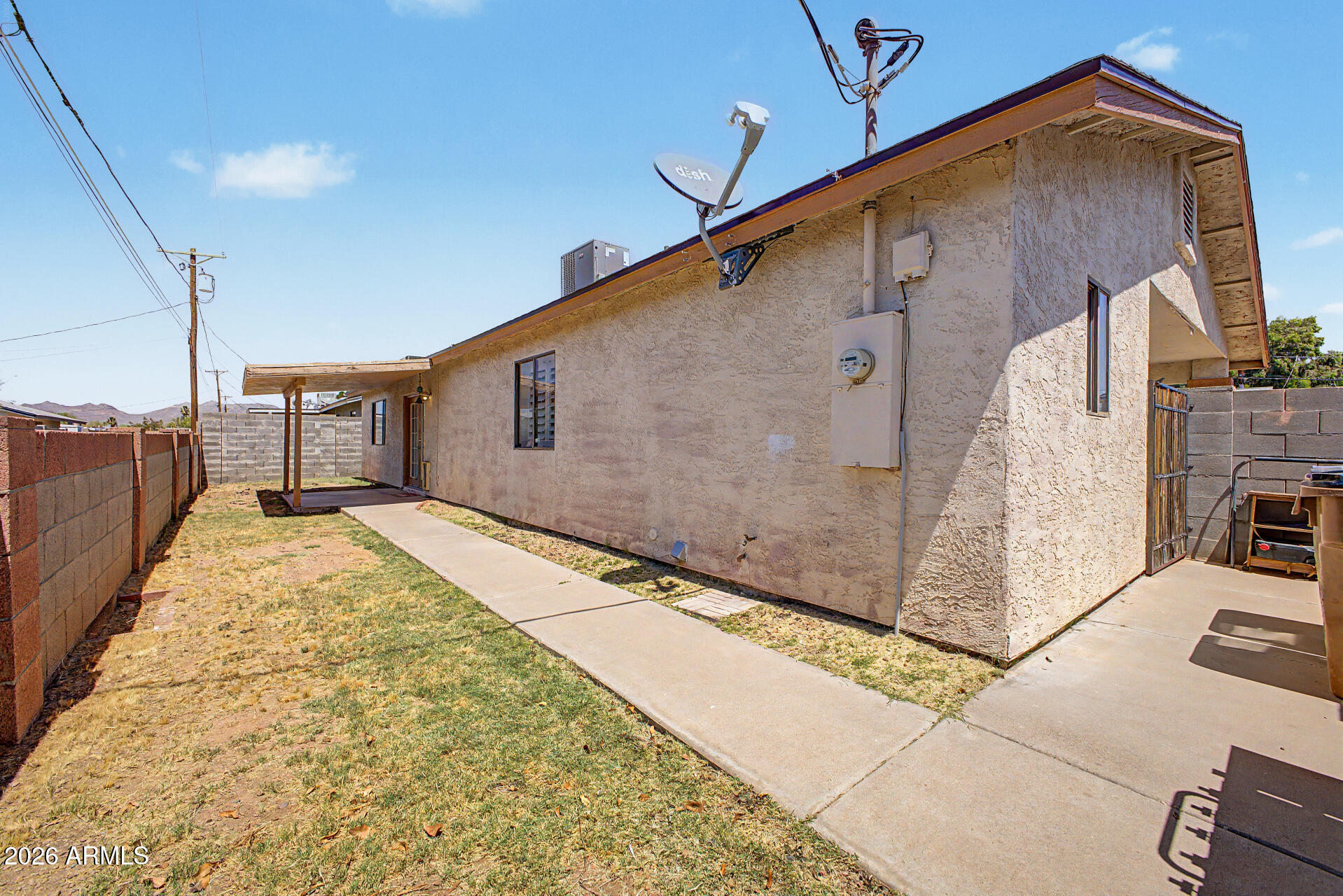 660 South Stardust Lane Apache Junction, AZ 85120 - Photo 14 of 15 a view of a house with backyard