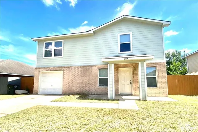 a house view with a outdoor space